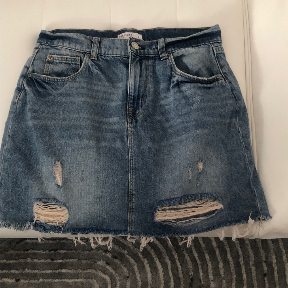 Casual Distressed Denim Mini Skirt.  Waist 14 inch across.   Length 15.5 inches
